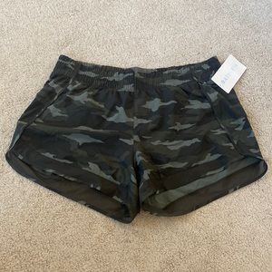 New with tags, never been worn camo Athleta running shorts